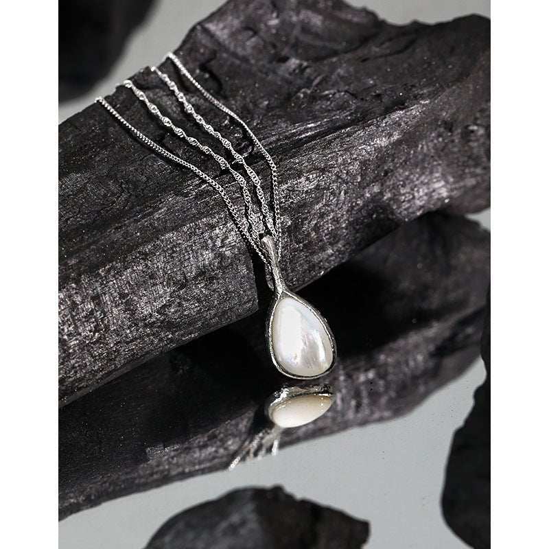 Elegant Waterdrop Mother of Shell 925 Sterling Silver NecklaceMain Stone: Mother of Shell
Main Stone Quantity: 1 
Pendant Size: 30mm * 13mm 
Metal Material: Solid 925 Sterling Silver
Metal Electroplating: Rhodium
Chain Length: JEWELLYJEWELLYShell 925 Sterling Silver Necklace