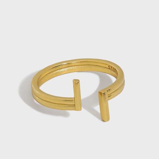 Fashion Double T Letters 925 Sterling Silver Adjustable RingRing Top Width: 10.5mm
Ring Diameter: 16.9mm
Metal Material: Solid 925 Sterling Silver
Metal Electroplating: 18K Yellow Gold/Rhodium
Ring Size: Open Size/Adjustable
JEWELLYJEWELLYLetters 925 Sterling Silver Adjustable Ring