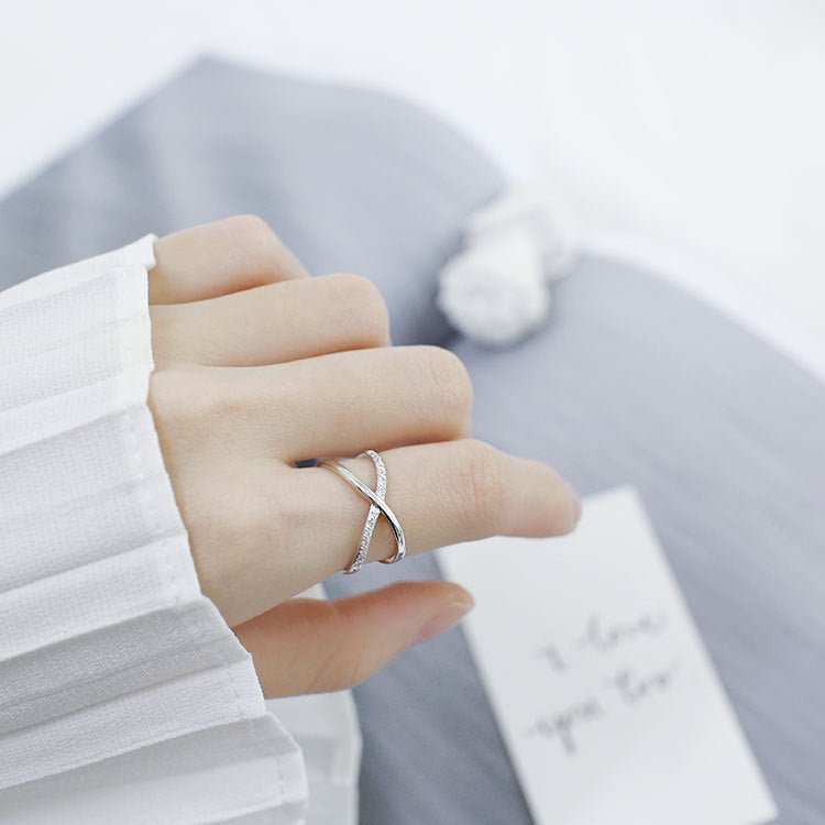 Fashion Simple X Twisted 925 Sterling Silver Adjustable RingMetal Material: Solid 925 Sterling Silver
Accent Stone: AAA Cubic Zirconia
Ring Top Size: 9mm
Inner Diameter: 16.1mm
Ring Size: Open Size/Adjustable
Metal ElectJEWELLYJEWELLYTwisted 925 Sterling Silver Adjustable Ring