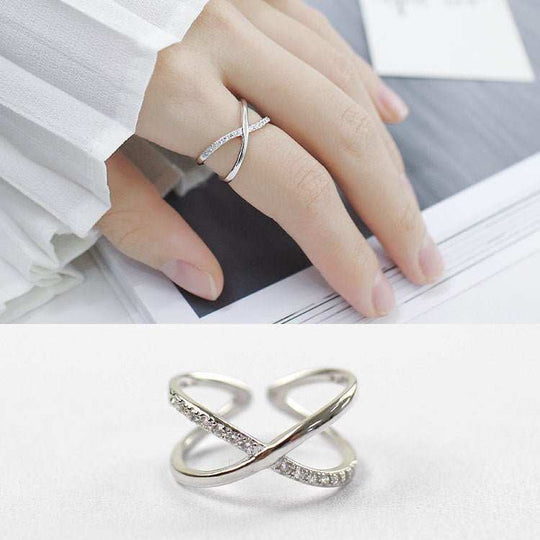 Fashion Simple X Twisted 925 Sterling Silver Adjustable RingMetal Material: Solid 925 Sterling Silver
Accent Stone: AAA Cubic Zirconia
Ring Top Size: 9mm
Inner Diameter: 16.1mm
Ring Size: Open Size/Adjustable
Metal ElectJEWELLYJEWELLYTwisted 925 Sterling Silver Adjustable Ring