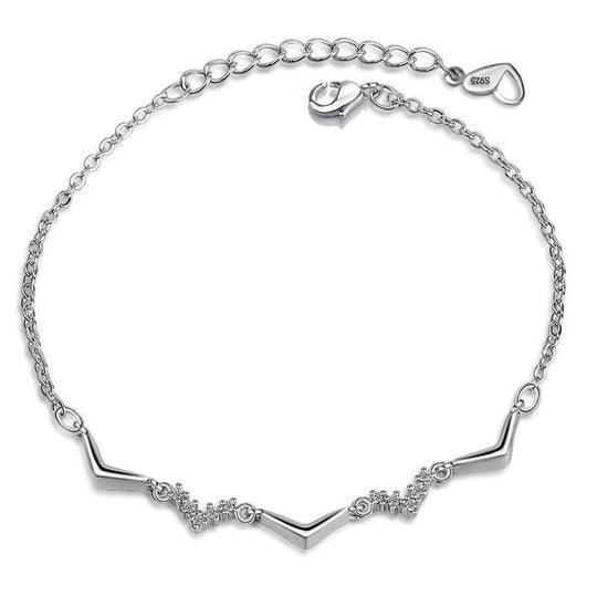 Girl CZ V Shape Wave 925 Sterling Silver BraceletMetal Material: Solid 925 Sterling Silver
Accent Stone: AAA Cubic Zirconia
Metal Electroplating: Rose Gold/Rhodium
Chain Length: 170mm + 40mm Adjustable
Total WeightJEWELLYJEWELLYShape Wave 925 Sterling Silver Bracelet