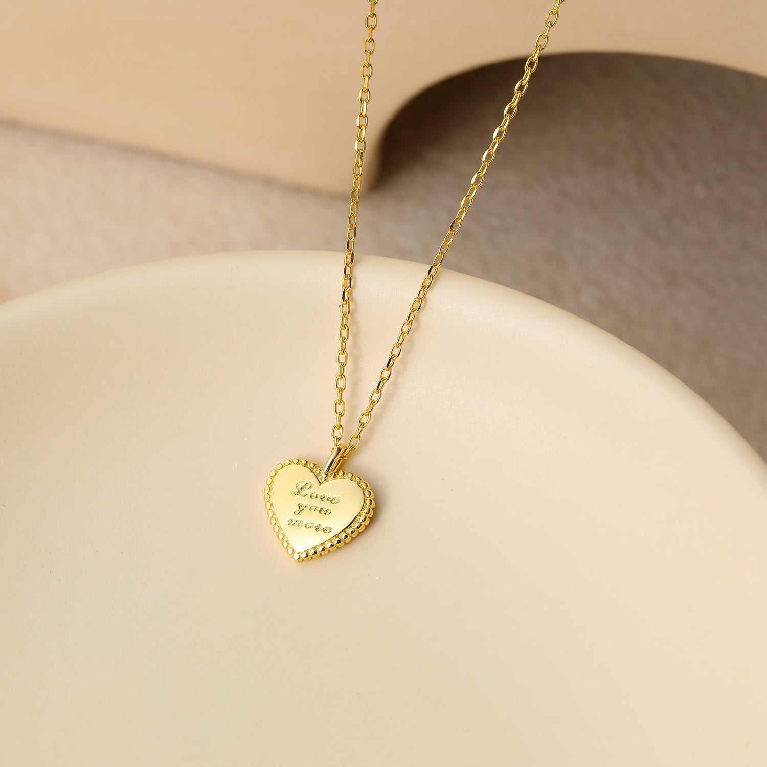 Love Your More Letters Heart 925 Sterling Silver NecklacePendant Size: 11.5mm
Metal Material: Solid 925 Sterling Silver
Metal Electroplating: 18K Yellow Gold/Rhodium
Chain Length: 405mm + 50mm Adjustable
Total Weight: JEWELLYJEWELLYLetters Heart 925 Sterling Silver Necklace