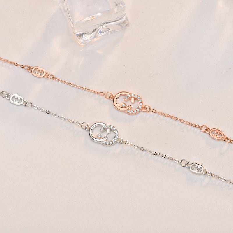 New Double C Letters CZ 925 Sterling Silver BraceletPendant Size: 7.4mm * 14.3mm 
Metal Material: Solid 925 Sterling Silver
Accent Stone: AAA Cubic Zirconia
Metal Electroplating: Rose Gold/Rhodium
Chain Length: 170mm JEWELLYJEWELLYLetters CZ 925 Sterling Silver Bracelet