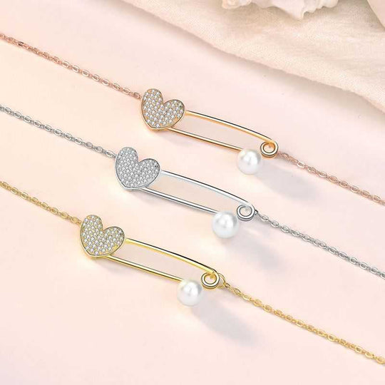 Not CZ Heart Clip Natural Pearl 925 Sterling Silver NecklaceMain Ston: Natural Pearl
Main Ston Quantity: 1
Pendant Size: 14.5mm * 34.3mm
Accent Stone: AAA Cubic Zirconia
Metal Material: Solid 925 Sterling Silver
Metal ElJEWELLYJEWELLYCZ Heart Clip Natural Pearl 925 Sterling Silver Necklace