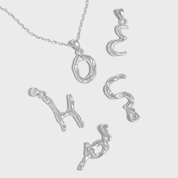 Simple Irregular Letters A-Z 925 Sterling Silver PendantPendantA-Z Size: 12mm - 16mm 
Chain Width: 1.45mm 
Metal Material: Solid 925 Sterling Silver
Metal Electroplating: 18K Yellow Gold/Rhodium
Chain Length: 390mm + JEWELLYJEWELLY925 Sterling Silver Pendant