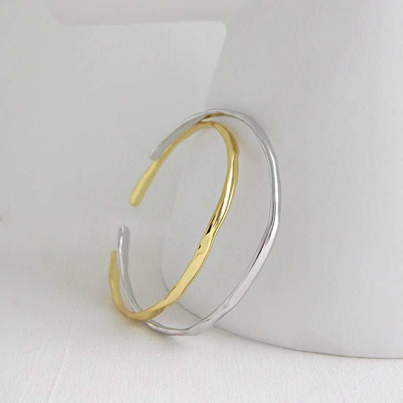 Simple Irregular Wave New 925 Sterling Silver Open BangleBangle Width: 3.6mm 
Bangle Diameter: 55mm
Metal Material: Solid 925 Sterling Silver
Metal Electroplating: 18K Yellow Gold/Rhodium
Bangle Size: Open Size/Adjustable
JEWELLYJEWELLY925 Sterling Silver Open Bangle