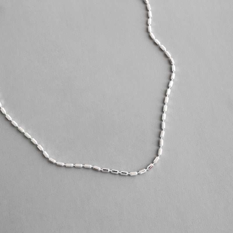 Simple New Geometry Irregular Tube 925 Sterling Silver NecklacePendant Size: 1mm 
Metal Material: Solid 925 Sterling Silver
Metal Electroplating: Rhodium
Chain Length: 375mm + 50mm Adjustable
Total Weight: 1.88gJEWELLYJEWELLYGeometry Irregular Tube 925 Sterling Silver Necklace