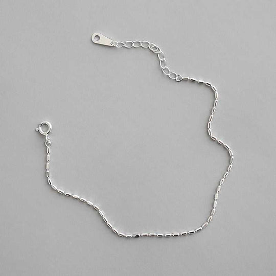 Simple Tube Beads 925 Sterling Silver BraceletPendant Size: 1mm 
Metal Material: Solid 925 Sterling Silver
Metal Electroplating: Rhodium
Chain Length: 160mm + 30mm Adjustable
Total Weight: 1.03gJEWELLYJEWELLYSimple Tube Beads 925 Sterling Silver Bracelet