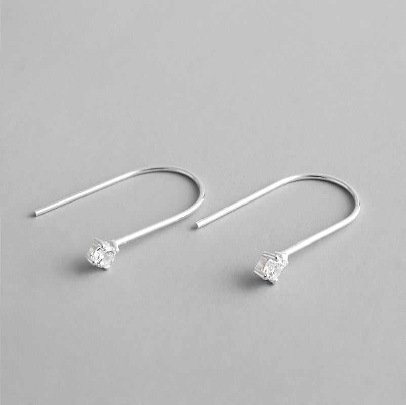 Simple U Shape CZ 925 Sterling Silver Dangling EarringsMain Stone: Cubic Zirconia
Main Stone Quantity: 2 
Earring Size: 2.8mm * 20mm 
Metal Material: Solid 925 Sterling Silver
Metal Electroplating: Rhodium
Total Weight: JEWELLYJEWELLYShape CZ 925 Sterling Silver Dangling Earrings