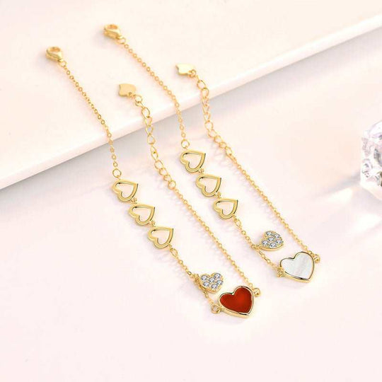 Sweet Heart To Heart CZ Natural Agate Mother of Shell 925 Sterling SilMain Stone: Natural Agate/Mother of Shell
Main Stone Quantity: 1 
Pendant Size: 10mm * 10mm 
Metal Material: Solid 925 Sterling Silver
Accent Stone: AAA Cubic ZirconJEWELLYJEWELLYShell 925 Sterling Silver Bracelet