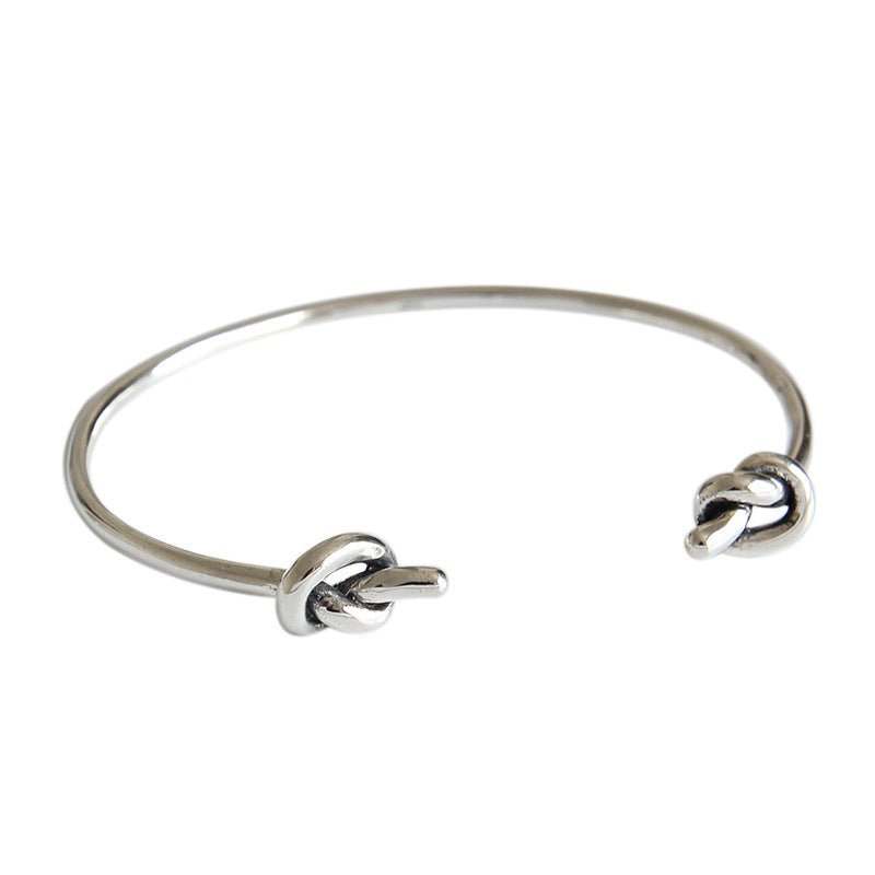 Vintage Two Knot 925 Sterling Silver Open BangleKnot Size: 8mm 
Bangle Width: 2.5mm 
Bangle Diameter: 60mm
Metal Material: Solid 925 Sterling Silver
Bangle Size: Open Size/Adjustable
Total Weight: 9.93gJEWELLYJEWELLYKnot 925 Sterling Silver Open Bangle